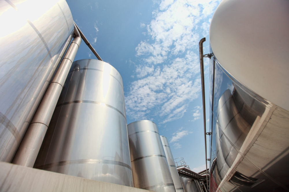 Silver silos and tank - industrial infrastructure